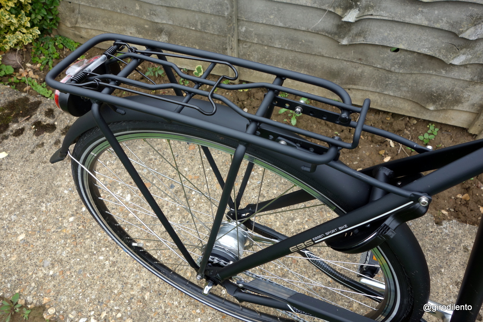 Sturdy rear rack (easily strong enough for 20kg+ loads) and a view of the Nexus hub