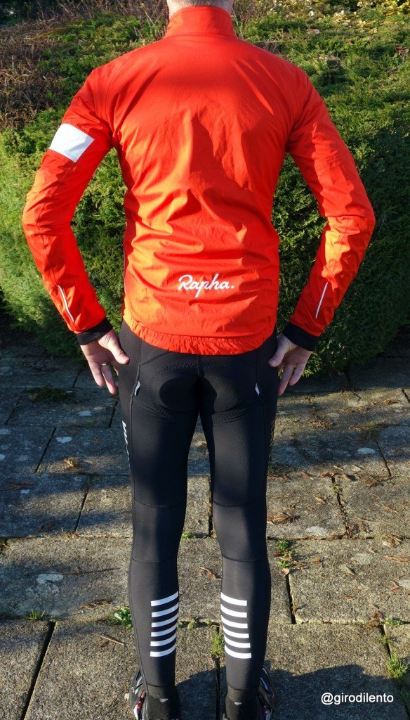 Rapha Rain Jacket from the rear. Reflective elements including the logo